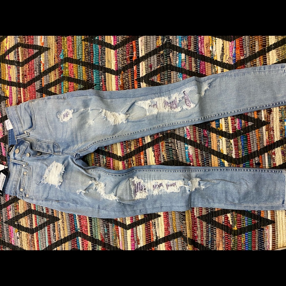 New Men’s ripped skinny Jeans w/bandana patches.